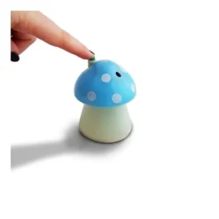 Automatisk tandpetare distributör i form av en orange svamp