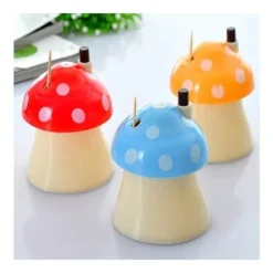 Automatisk tandpetare distributör i form av en orange svamp