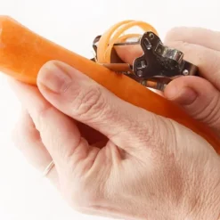 Dubbel stålskalare för frukt och grönsaker 11,5 cm