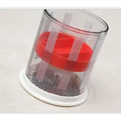 Köksutensilier - CONFO - Osthyvel - Rostfritt Stål - Diskmaskinsvänlig - Röd