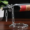 Vinflaskhållare-Kreativ magisk kedja i form av rödvinsflaskhållare