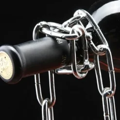 Vinflaskhållare-Kreativ magisk kedja i form av rödvinsflaskhållare