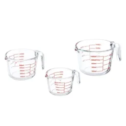 Mått & Måttskedar-Måttkannset, 7x10x13.5 cm, Transparent, Röd