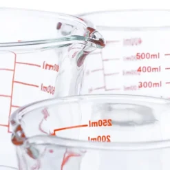 Mått & Måttskedar-Måttkannset, 7x10x13.5 cm, Transparent, Röd