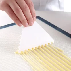 Triangulär konfektskrapa, TANDIG, rostfritt stål, 110x110mm - HENDI 554227