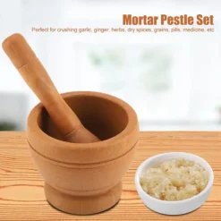 Vitlökskvarn i plast - köksredskap för att mala kryddor och örter